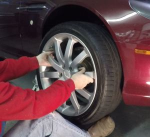 Installing the Road Wheel on an Aston Martin DB9
