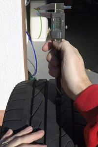 Measuring the Tire Tread Depth with a Vernier Caliper