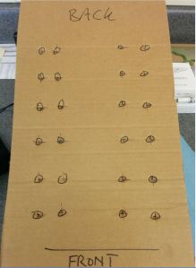 carboard-to-hold-the-removed-spark-plugs-and-fuel-injectors