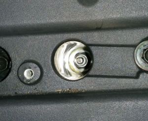 inspecting-the-spark-plug-well-for-oil-buildup-on-an-aston-martin-db9