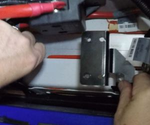 installing-the-battery-bracket-in-an-aston-martin-db9