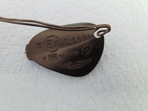 using-the-special-tool-to-remove-the-wing-side-mirror-access-cover-on-an-aston-martin-db9